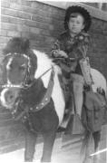 Cute seven year old Charlene Campanale taking her 10-cent pony ride, several years before the fire. (Photo Courtesy of Charlene Jancik)